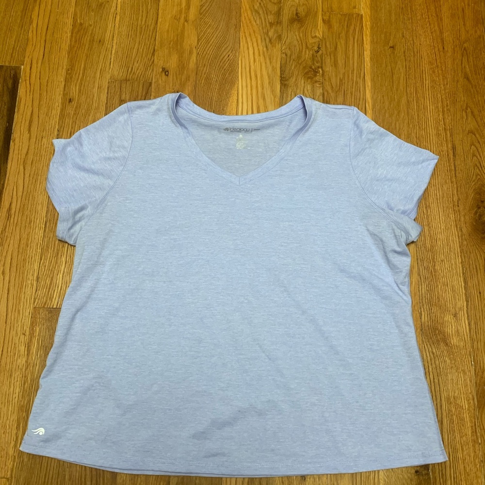 3x performance tee.  Ideology. Lit blue